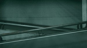 clip-1100926533-side-view-car-moving-underground-parking-industrial