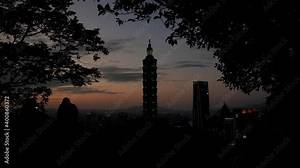 Taipei 101 skyline at sunset, Taiwan. Mid angle, parallax movement, slow motion, HD.