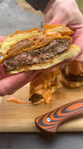 Sweet and Savory Bulgogi Kimchi Burgers 🍔🔥 This burger has all the flavors of a classic Korean bulgogi dish with a spicy gochujang mayo spread and fresh kimchi on top. We mixed together ground pork, dark brown sugar, soy sauce, sesame oil, and some sweet onion to form the patties. Pair it with some crispy fries and you’ve got yourself a proper feast over the fire 🔥 #FeedYourFire #bulgogi #kimchi #burger #gochujang #recipe #grilling #cookingoverfire | Breeo