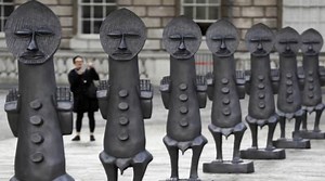 Army of black statues stands guard at African art show in London