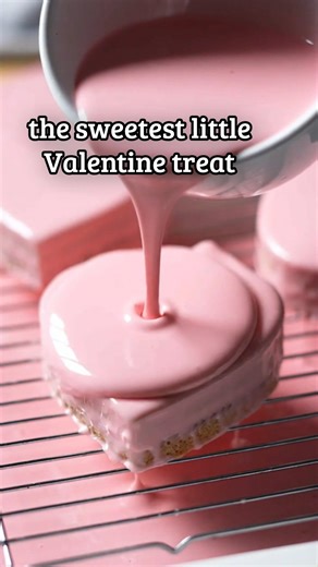 These mini Valentine petit fours look bakery-fancy but are easy at home. Soft cake, raspberry center, and the prettiest pink finish. Valentine’s Heart Petit Fours Yield 20 to 24 mini heart petit fours Time Prep: 40 minutes Bake: 18 to 22 minutes Chill and glaze: 60 to 90 minutes You will need 8x8 inch square pan Heart cutter, about 1.5 to 2 inch Wire rack Ingredients Vanilla cake base 1 cup all purpose flour 1 tsp baking powder 1/4 tsp salt 1/2 cup unsalted butter, softened 2/3 cup sugar 2 large