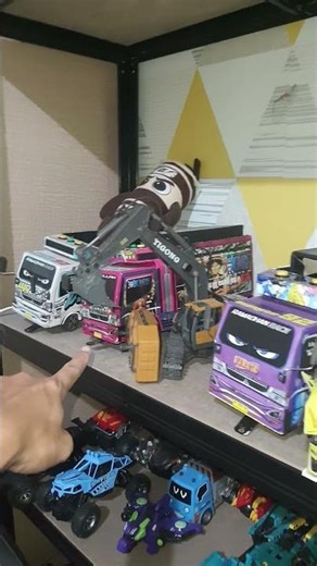 miniature bus and truck swerves Basuri