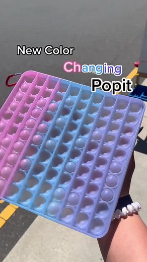 New sun color changing popit!! #colorchanging #popit #fidgettoys #fidgetfun #trendy #uv #sun #learningexpress
