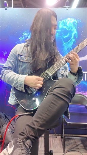 17 century chicken pick with my signature guitar in Namm show 2026