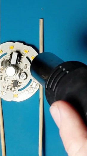 Removing Electronic Components from an LED Bulb PCB Using a Heat Gun