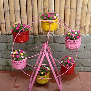 401K views · 6.5K reactions | Watch How to Build a Ferris Wheel to Grow Flowers #DIY #garden | Balcony Garden Ideas | Facebook