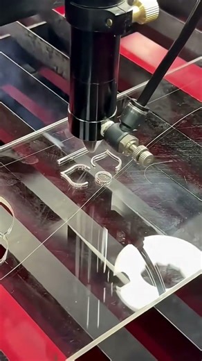 Making patterns on glass using a precision machine