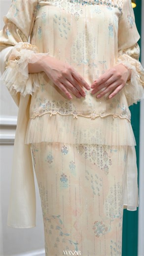 Wanzar® on Instagram: "A closer look at DORIEE ✨ From the diamond smocking across the shoulder to the delicate hand-beaded embellishments, every detail is crafted to elevate your Raya look. Finished with pleated net edges on the sleeves and hemline for a soft, graceful touch. Release tonight at 8.30pm!"