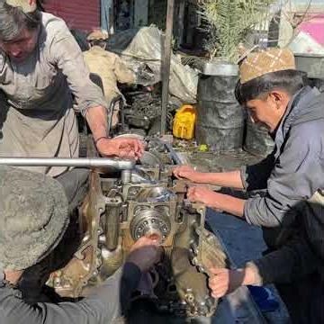 Afghaan Mechanic demonstrates German V8 engine Assembly with Basic tools!