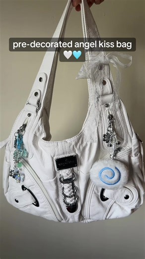 This bag comes with all the charms in the video for $14,800💕 Vintage y2k Angel kiss bag👜 DM to purchase, delivery and pickup available. #fyp #guyana🇬🇾