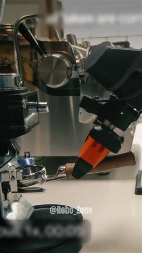 A robotic barista system grinding, brewing, and serving coffee with high precision, demonstrating consistent dosing, controlled extraction, and repeatable workflow automation. A look at how service robotics is moving into real commercial environments. #robotics #automation #engineering #robotbarista #robotdemo
