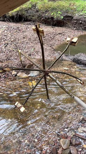 This is how you can build a water rotisserie to turn your deer meat out in the wild #waterwheel #theeliteonlinehunters #hunting #wild #outdoors #bushcraftskills #survivor #huntingdeer #meateater #wildgame #bushcraft #bushcrafting | The Elite Online Hunters