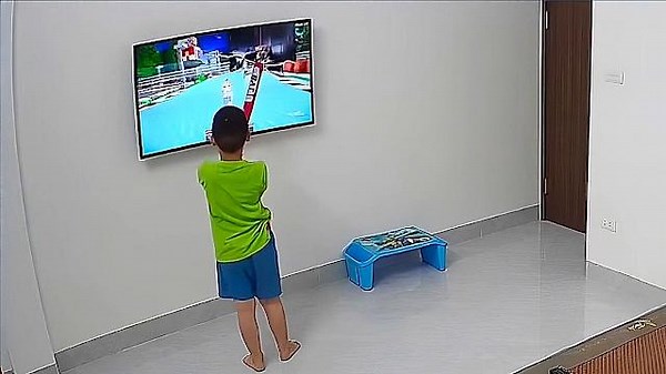 Kid accidentally breaks TV with baseball bat
