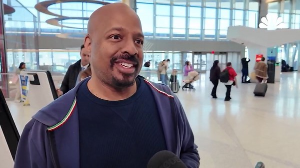 Santa Claus joins sharks at a Rio de Janeiro aquarium