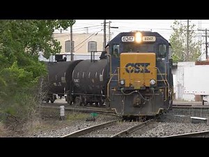 A vanishing conductor and New York Central tag on CSX 6247 L317 with Chessie System Difco dump cars