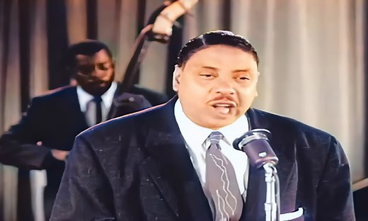 Big Joe Turner - Shake, Rattle and Roll (Live) (1954) "Shake, Rattle and Roll," performed by Big Joe Turner in 1954, is an iconic song that played a pivotal role in the birth and rise of rock 'n' roll. Written by Jesse Stone under the pseudonym Charles E. Calhoun, it blended rhythm and blues with spirited, suggestive lyrics. Turner's deep, powerful voice and the song's infectious rhythm captured the rebellious spirit of the era, making it more than just a track—it was an anthem for the burgeonin