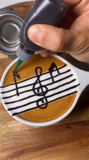 Meet the artist who transforms every latte into a masterpiece! Using chocolate syrup, cocoa, caramel, and other sweet toppings, he crafts mesmerizing designs right on the surface of your coffee. Each cup becomes a miniature canvas, brimming with warmth, creativity, and delicious flavor. From elegant swirls to intricate illustrations—these lattes are almost too beautiful to drink. Just look at how imaginative these creations are! Which one would you choose? ☕️🎨 Artist: @latteartcity #LatteArt #C