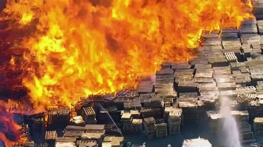 Crews battled a massive 3-alarm pallet fire in Southern Dallas
