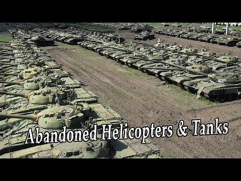 Abandoned Military Helicopters And Tanks. Junkyard Military Vehicles Exploring. Rusty Tanks Wreck