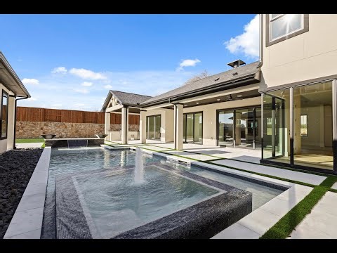 Custom Home by Partners in Building in Windsong Ranch