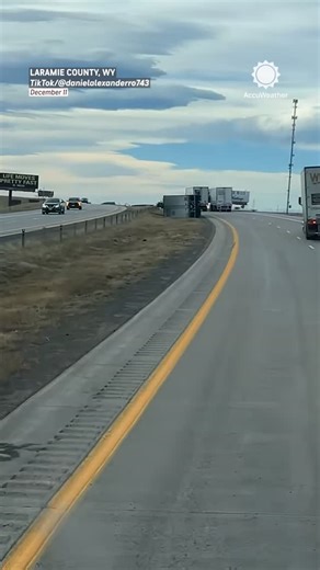 AccuWeather on Instagram: "Caught on camera: Watch as a semi flips over from strong winds along I-25 in Wyoming."