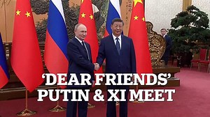 Putin calls Xi 'dear friend' as he arrives to warm welcome in China
