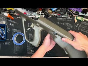 Steyr AUG how to remove / install stock latch (A1 A3 button lock lower)