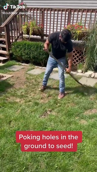 Poking holes in the ground for seeding! #landscape #landscaping #outdoor #work #grass