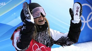 Ukrainian and Russian celebrate medals with hug at Olympics
