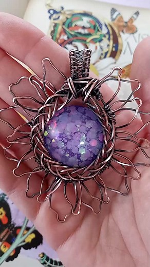 Mystic Purple Flower Resin Necklace 💜💜💜 A breathtakingly beautiful talisman that embodies spiritual growth, transformation, and enlightenment. Its majestic purple hue resonates deeply with the crown chakra, facilitating a profound connection to the divine. This stunning necklace radiates an otherworldly aura, reminding the wearer of their own inherent magic and limitless potential✨ 70 #flowers #necklace #wirewrappedjewelry | Amber's Art