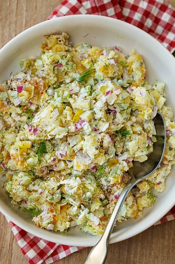 This light, wholesome, and totally satisfying dish will win you over with every bite. RECIPE: https://natashaskitchen.com/smashed-potato-salad/ | NatashasKitchen.com