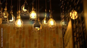 Retro Light Bulb Lighting Series. Lights with brick wall. Traditional classic ceiling light bulb lighting for video opening or closing background.