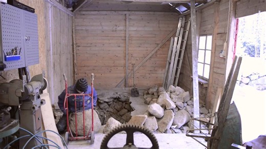 Digging a foundation with a power hammer – brutal groundbreaking begins