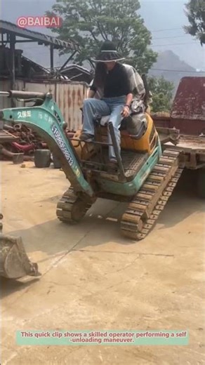 How an Excavator Unloads Itself from a Truck