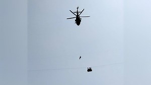 'Commando' seen descending from helicopter