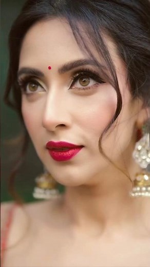 Bidya Sinha Mim dazzles in a traditional Bengali red & white saree — grace, beauty & festive vibes!
