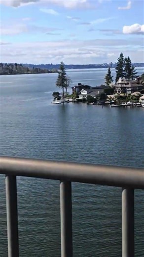 On bridge overlooking Lake Washington channel with Merlin Extralight Titanium Bicycle