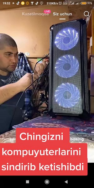 Examining a PC Tower with LED Fans