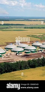 Aerial video of Biogas plant. The agricultural and greenhouse complex is equipped with its own biogas for the production of biogas, Europe