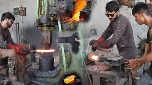 The Art of Producing Damascus Axes in a Factory