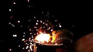 Extreme Slow Motion Macro Video of a Lighter Being Lit