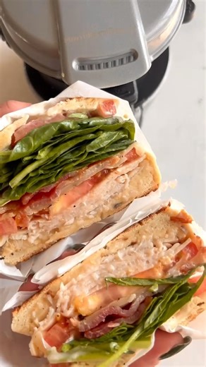 Hero sandwich? More like SANDWICH HERO! Our Breakfast Sandwich Maker conquers mealtime anytime in 5 minutes or less. https://bit.ly/3WYYGjP Ingredients 1 everything bagel, halved 2 slices bacon, cut in half 3-4 slices roasted turkey 2 slices tomato 2 slices mozzarella cheese 1 tablespoon Mayonnaise Salt and pepper for seasoning Iceberg lettuce or spinach, optional Directions Preheat Breakfast Sandwich Maker until green preheat light comes on. Lift cover, top ring, and cooking plate. Place bottom