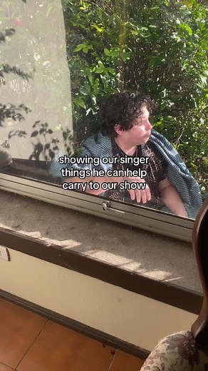 Enthusiastic Singer Receives Funny Band Support