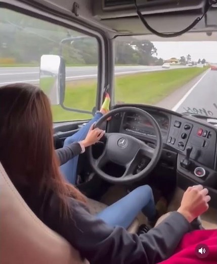 Driving a truck in socks.