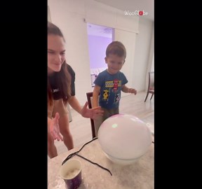 Dry ice bubble swells over bowl and pops during home experiment