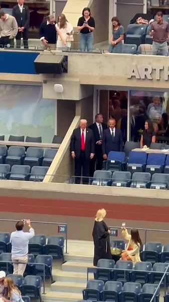 Trump arrives at US Open as event faces delays over security