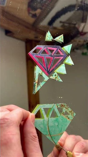 Double colored paper diamond on mirror 🥹