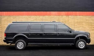 Most Luxurious, Armored Ford Excursion Limo Sells for Peanuts