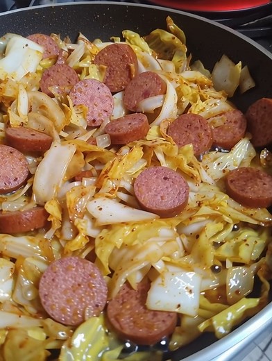 Buttered Kielbasa & Cabbage Skillet This is one of those simple meals that always hits the spot. Nothing fancy, just good ingredients, lots of butter, and big flavor. It’s even better the next day. Ingredients: 2 pounds Polska kielbasa, sliced on the bias into bite-size pieces 3 tablespoons butter (plus more if needed) 1 large onion, cut into big chunks 1 head of cabbage, coarsely chopped 4 cloves garlic, minced 2 tablespoons red wine vinegar 1 teaspoon black pepper Sea salt, to taste 1 teaspoon