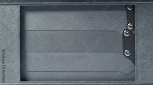 Actuation of the shutter mechanism of an old film camera inside the camera body. Chroma key in the background. Camera shutter release, detailed shooting. Vintage camera shutters.